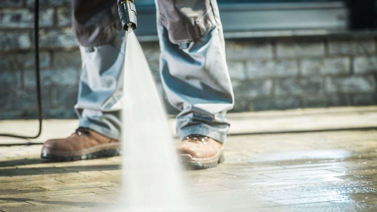 clean your concrete garage floor with water pressure
