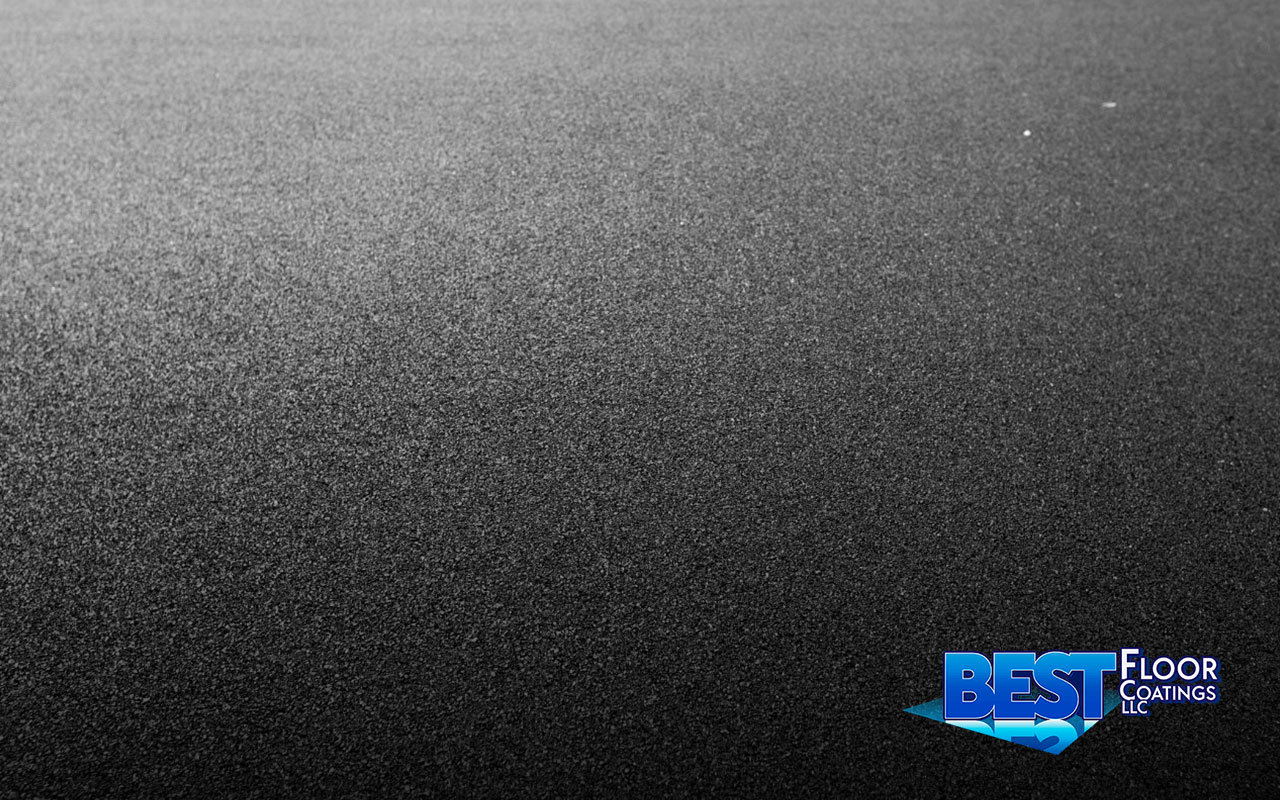 Fast-drying polyaspartic floor coating for a quick garage upgrade.